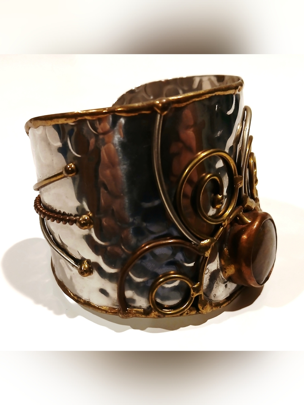 Vintage Hammered Metal Cuff Bracelet with Swirls and Brown Stone